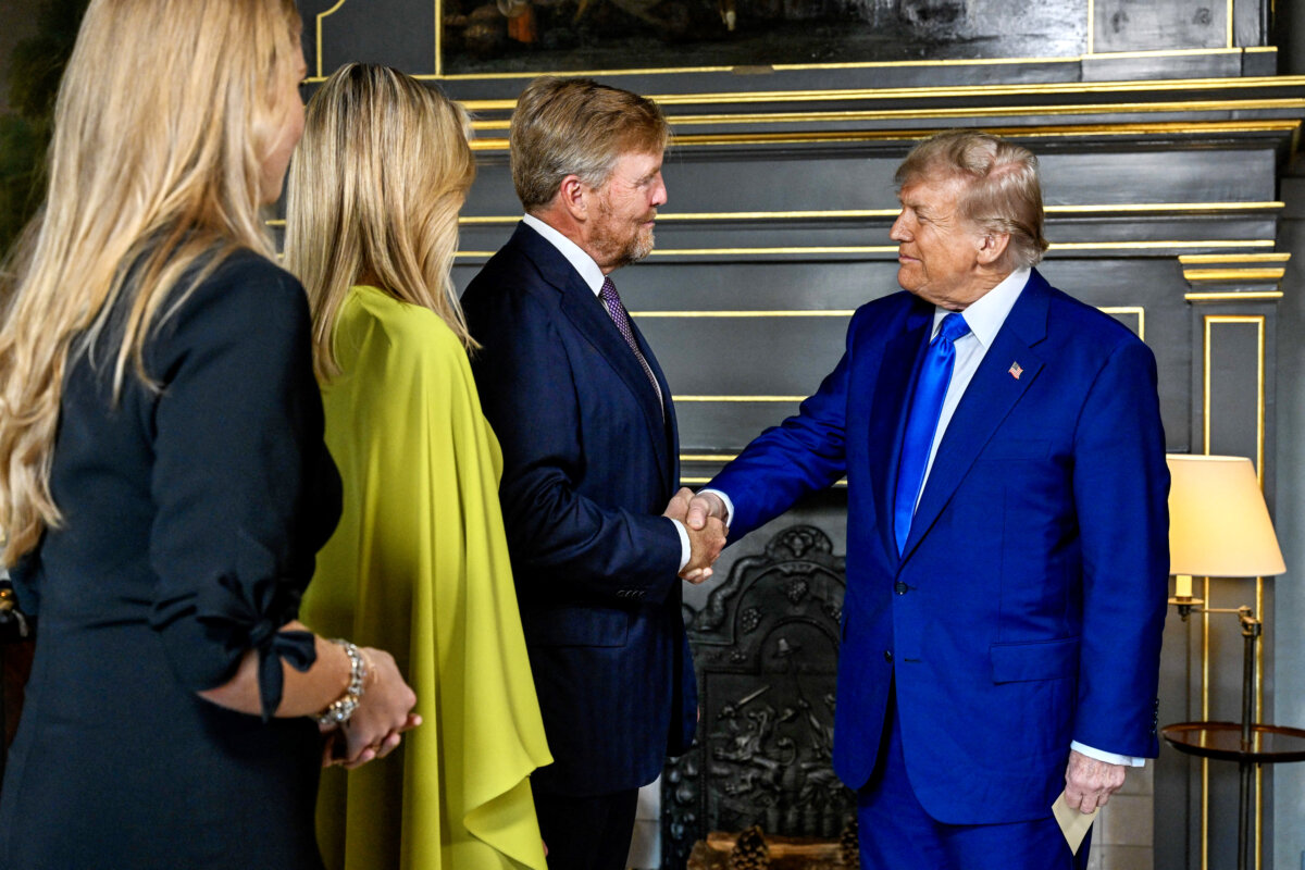 King Willem-Alexander (2nd R) and Queen Maxima (2nd L) of the Netherlands, along with Crown Princess Amalia (L), greet U.S. President Donald Trump (R) prior to a social dinner with NATO country leaders at the "Huis ten Bosch" Royal Palace, during a North Atlantic Treaty Organization (NATO) Heads of State and Government summit in The Hague, on June 24, 2025. (Mischa Schoemaker/Pool/AFP via Getty Images)