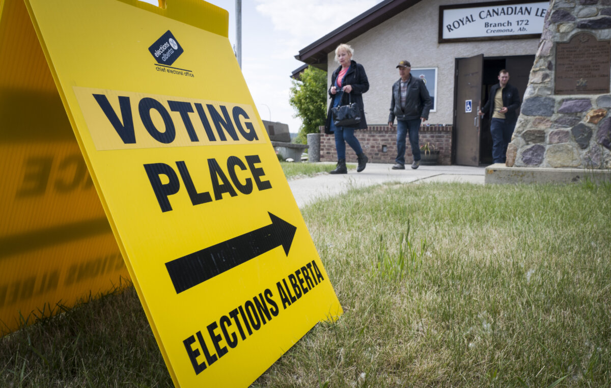 Voters leave a polling station after casting ballots in an Alberta byelection for the Olds-Didsbury-Three Hills riding, in Cremona, Alta., on June 23, 2025. (The Canadian Press/Jeff McIntosh)