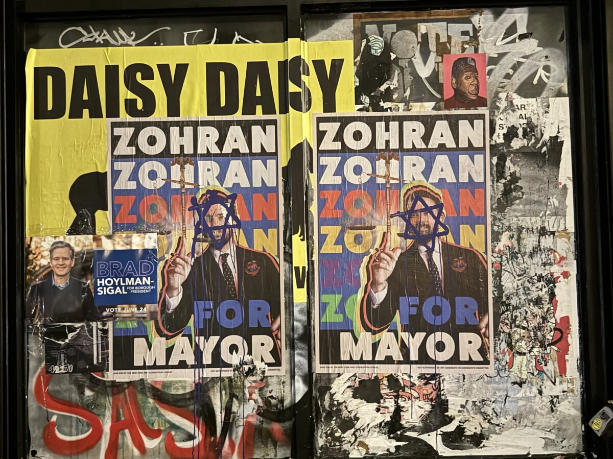 Posters supporting Zohran Mamdani in the Cooper Square area of Manhattan, N.Y., on June 18, 2025. (Arjun Singh/The Epoch Times)