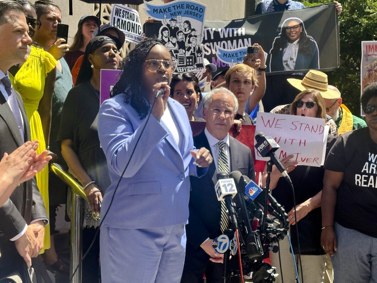 Rep. LaMonica McIver (D-N.J.) speaks to a crowd after her arraignment, outside the New Jersey federal courthouse in Newark on June 25, 2025. (Juliette Fairley/The Epoch Times)