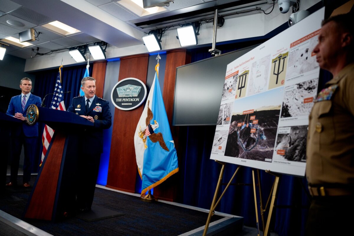 Chairman of the Joint Chiefs of Staff Air Force Gen. Dan Caine (2nd L), accompanied by Defense Secretary Pete Hegseth (L), speaks during a news conference at the Pentagon in Arlington, Va., on June 26, 2025. (Andrew Harnik/Getty Images)