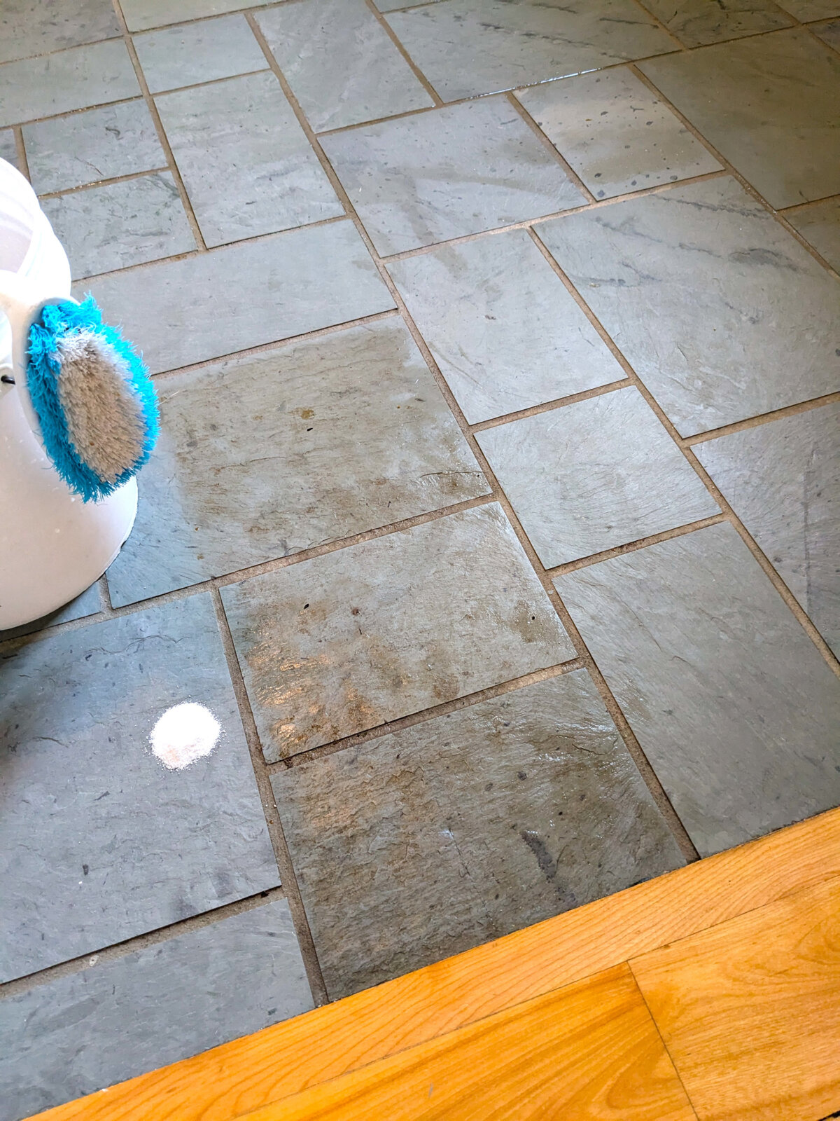 This side-by-side slate floor comparison should convince you the tiny pile of powdered oxygen bleach is your best all-purpose cleaner. (Tim Carter/Tribune Content Agency)