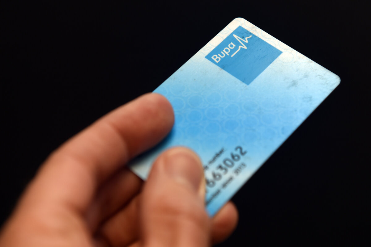 A Bupa Health Insurance membership card is displayed in Sydney on Sept. 12, 2016. (AAP Image/Paul Miller)