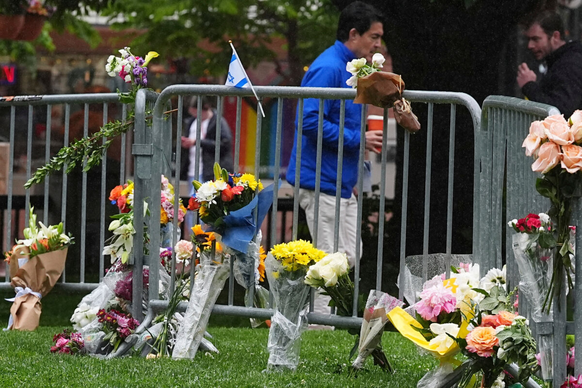 Bouquets of flowers stand along a makeshift memorial for victims of an attack outside of the Boulder County, Colo., courthouse in Boulder, Colo., on June 3, 2025. (David Zalubowski/AP Photo)