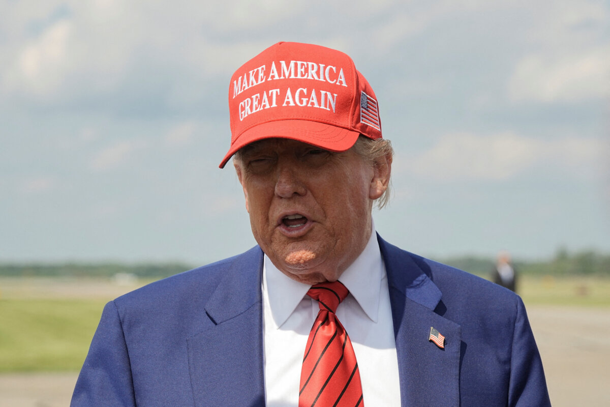 President Donald Trump talks to reporters upon his arrival at Morristown Municipal Airport in Morristown, New Jersey, on June 20, 2025. (Reuters/Ken Cedeno/File Photo)