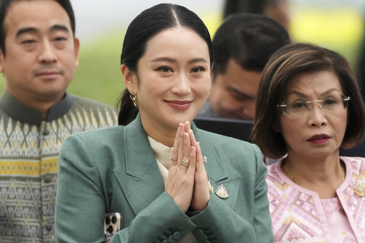 Thai Prime Minister Paetongtarn Shinawatra (C) arrives for a Cabinet meeting at Government House in Bangkok on July 1, 2025. (Sakchai Lalit/AP)