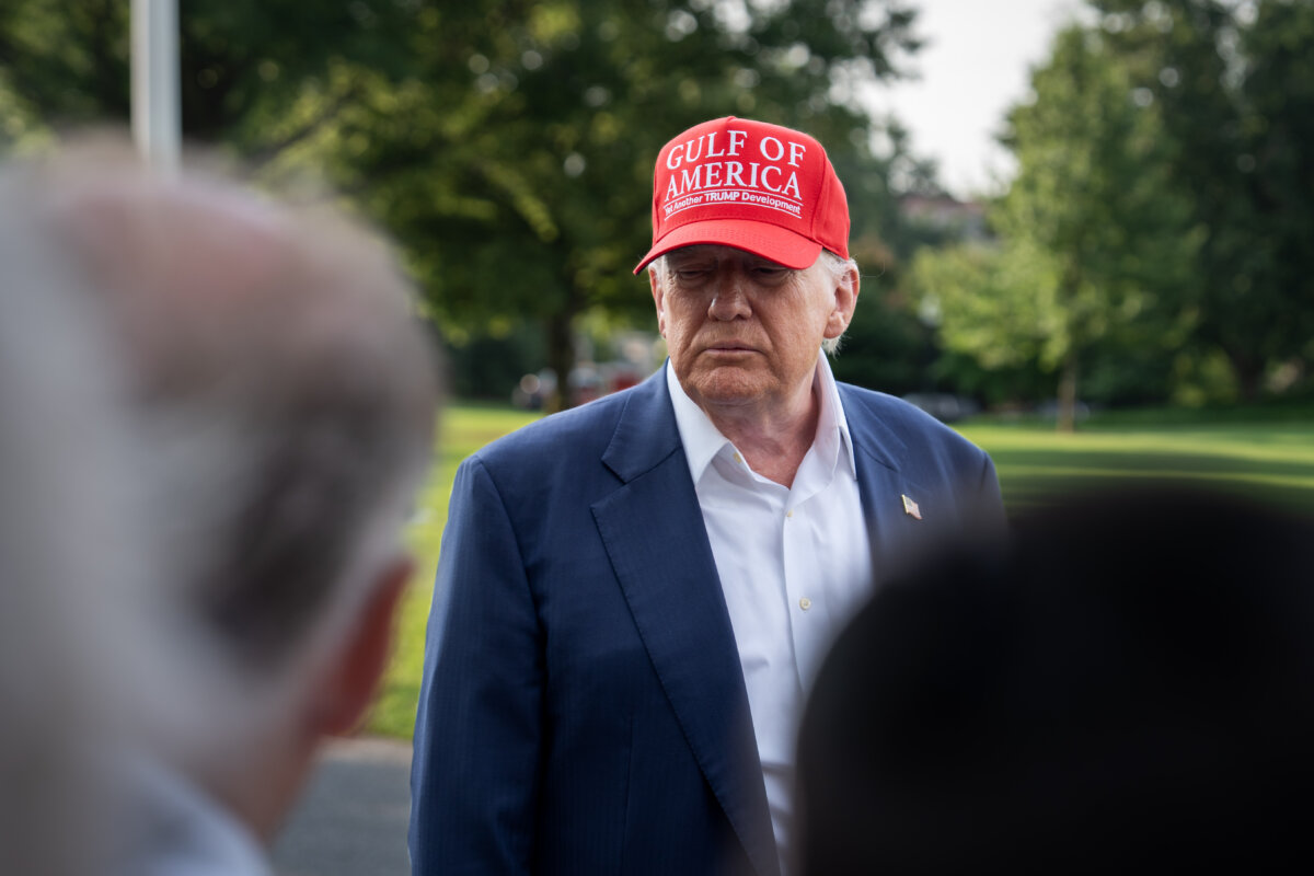 President Donald Trump speaks with reporters as he departs for Florida from the White House on July 1, 2025. (Madalina Kilroy/The Epoch Times)