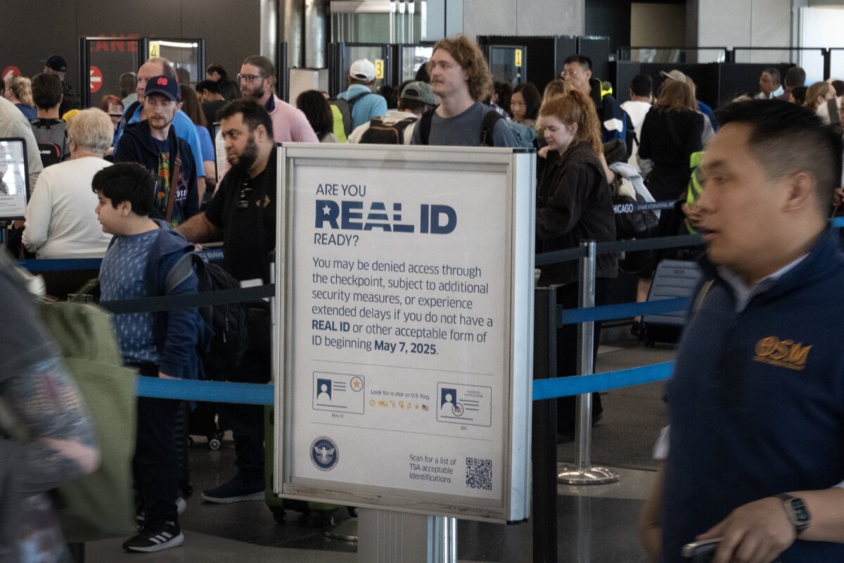 Passengers go through a security checkpoint at O'Hare International Airport in Chicago, Ill., on May 7, 2025. (Scott Olson/Getty Images)