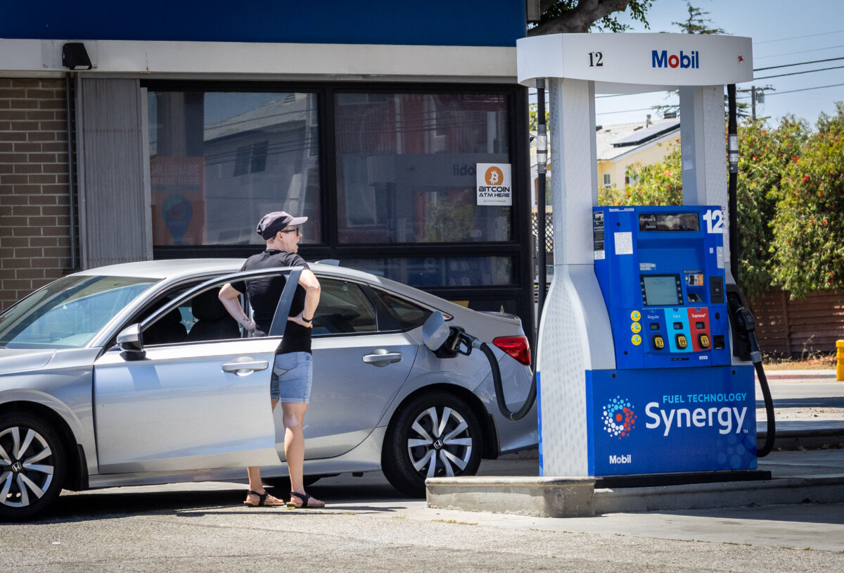 A woman fills her car with gasoline in Los Angeles on July 1, 2025. (John Fredricks/The Epoch Times)