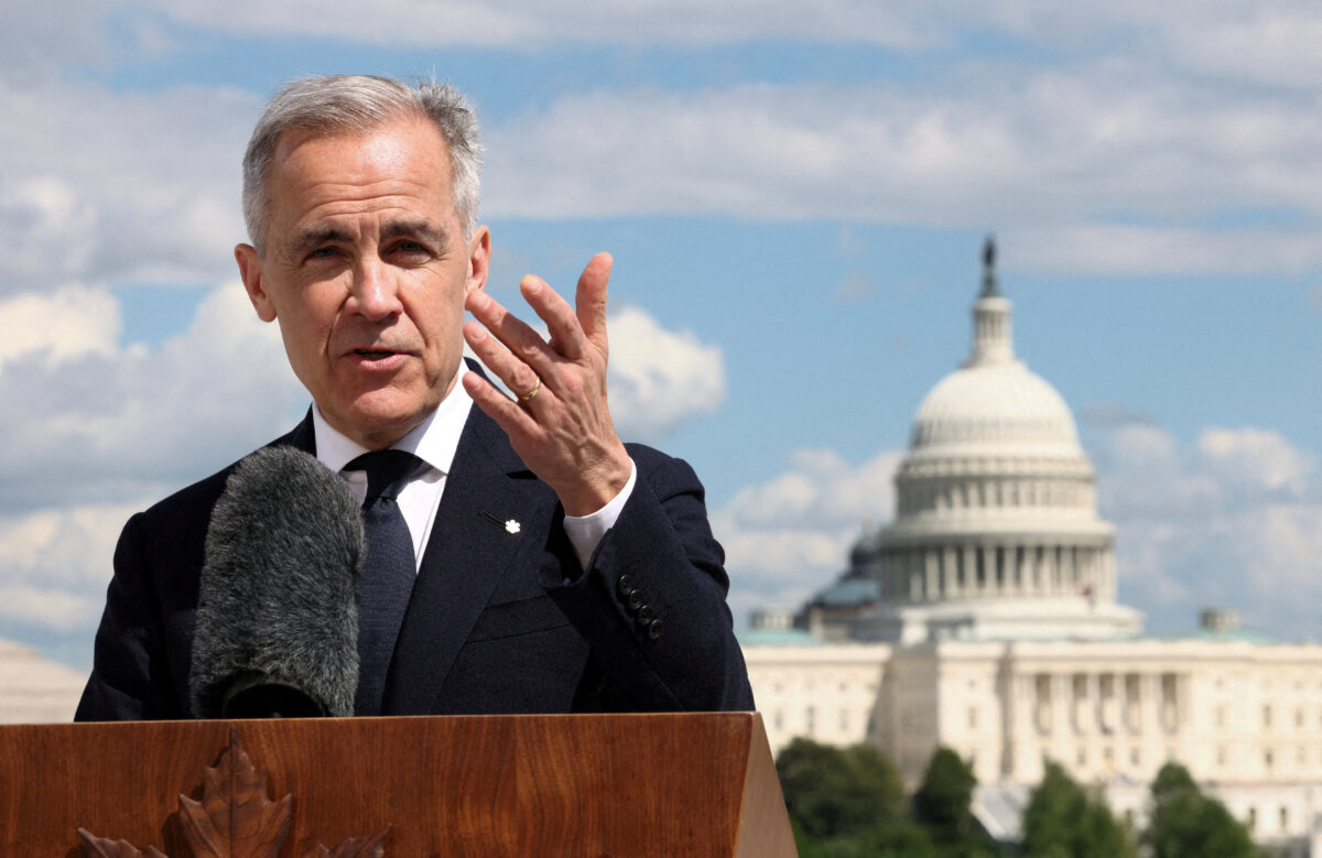 With the U.S. Capitol in the background, Canadian Prime Minister Mark Carney speaks to reporters after his meeting with U.S. President Donald Trump, during a press conference at the Canadian Embassy in Washington, D.C., on May 6, 2025. (Kevin Lamarque/Reuters)