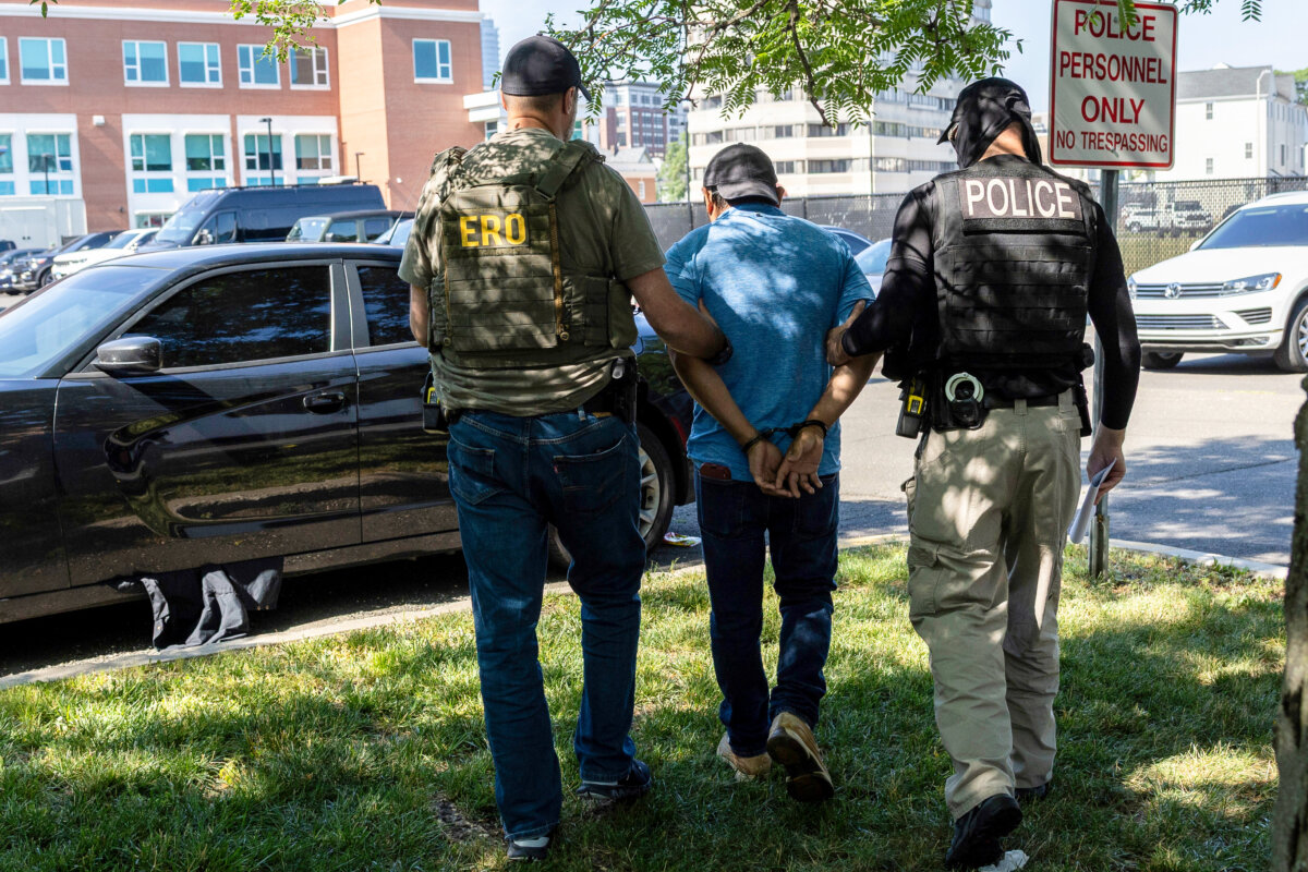 Agents from Immigration and Customs Enforcement (ICE) detain an illegal immigrant after a court hearing at the Connecticut Superior Court in Stamford, Conn., on July 3, 2025. (John Moore/Getty Images)