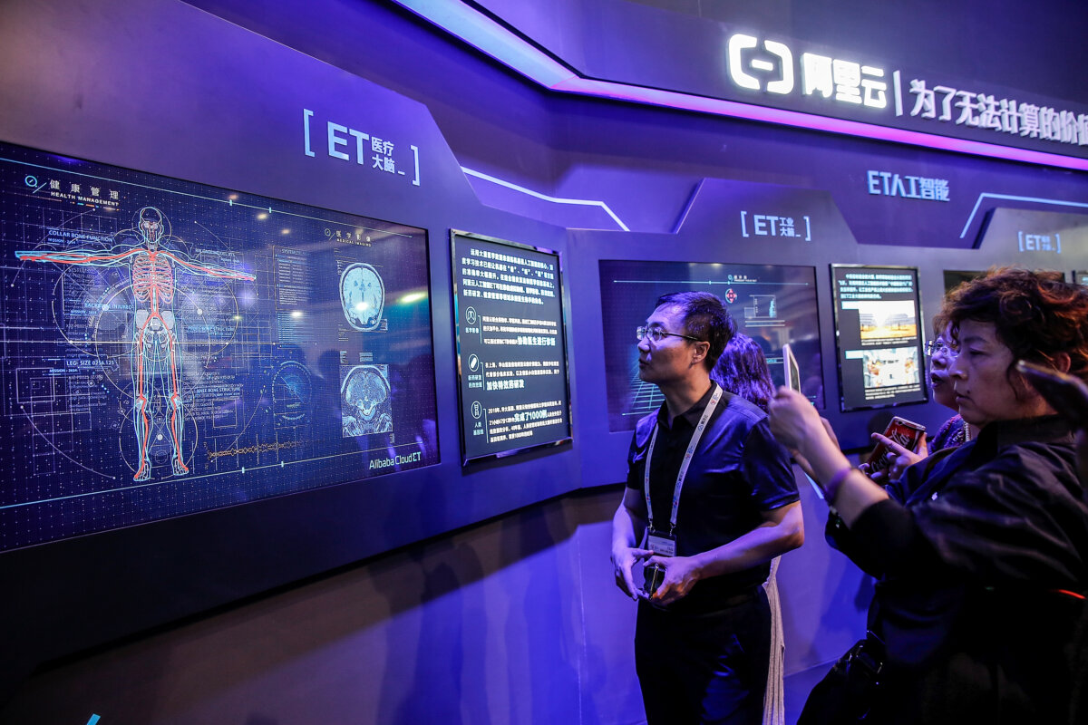 The public visit Data Analysis Center during the 2017 China International Big Data Industry Expo at Guiyang International Eco-Conference Center in Guiyang, China, on May 27, 2017. (Lintao Zhang/Getty Images)