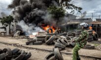 Day in Photos: Unrest in Kenya, Festival of San Fermin, Typhoon in Taiwan