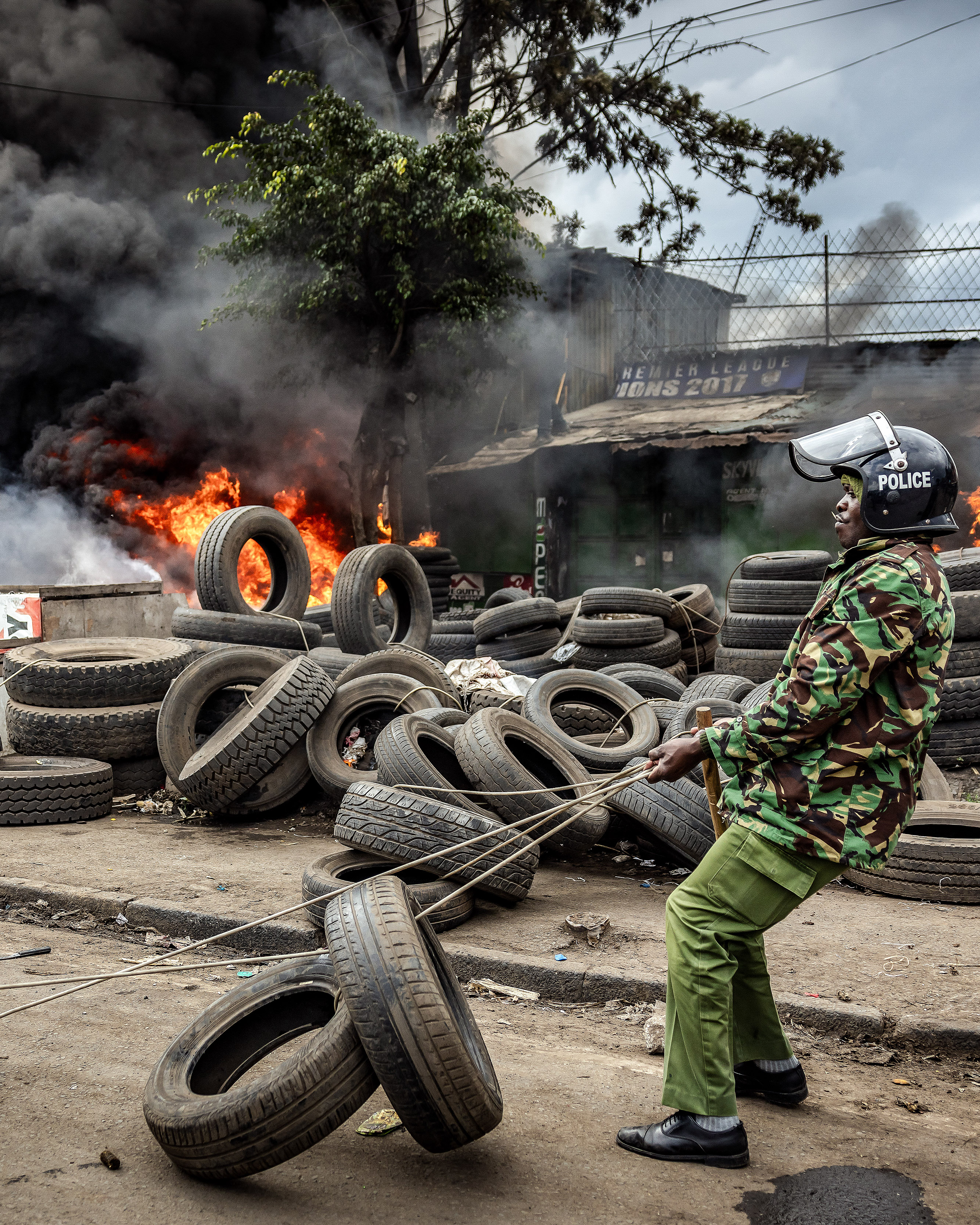 Day in Photos: Unrest in Kenya, Festival of San Fermin, Typhoon in Taiwan