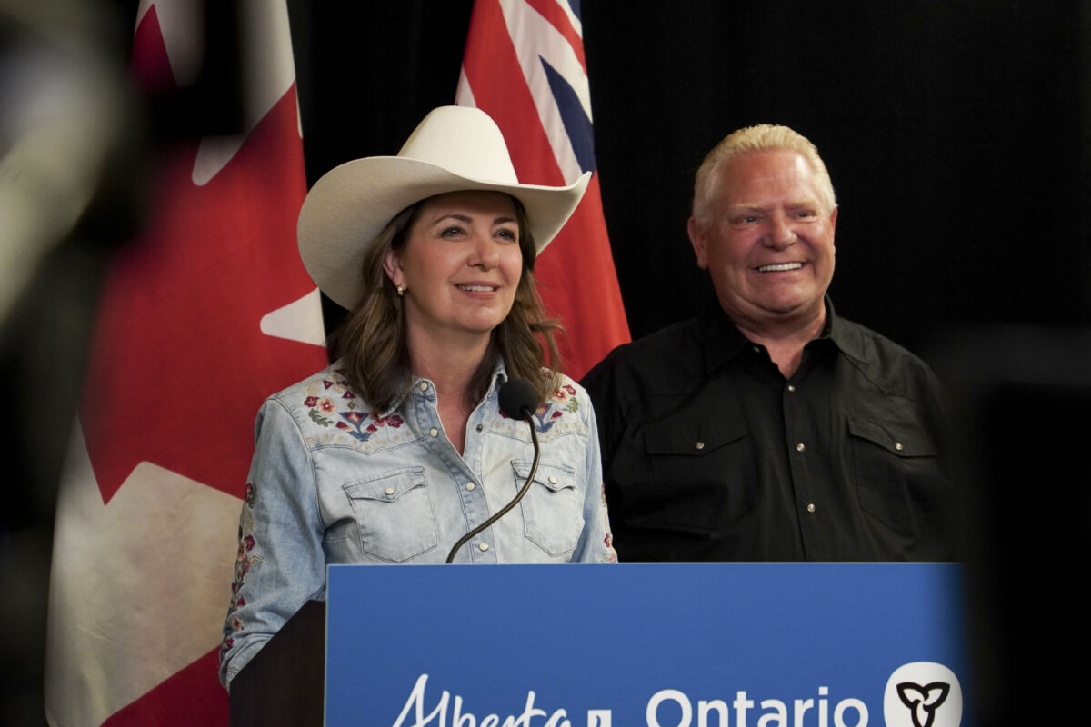 Alberta Premier Danielle Smith and Ontario Premier Doug Ford speak at a press conference in Calgary on July 7, 2025. (Carolina Avendano/The Epoch Times)