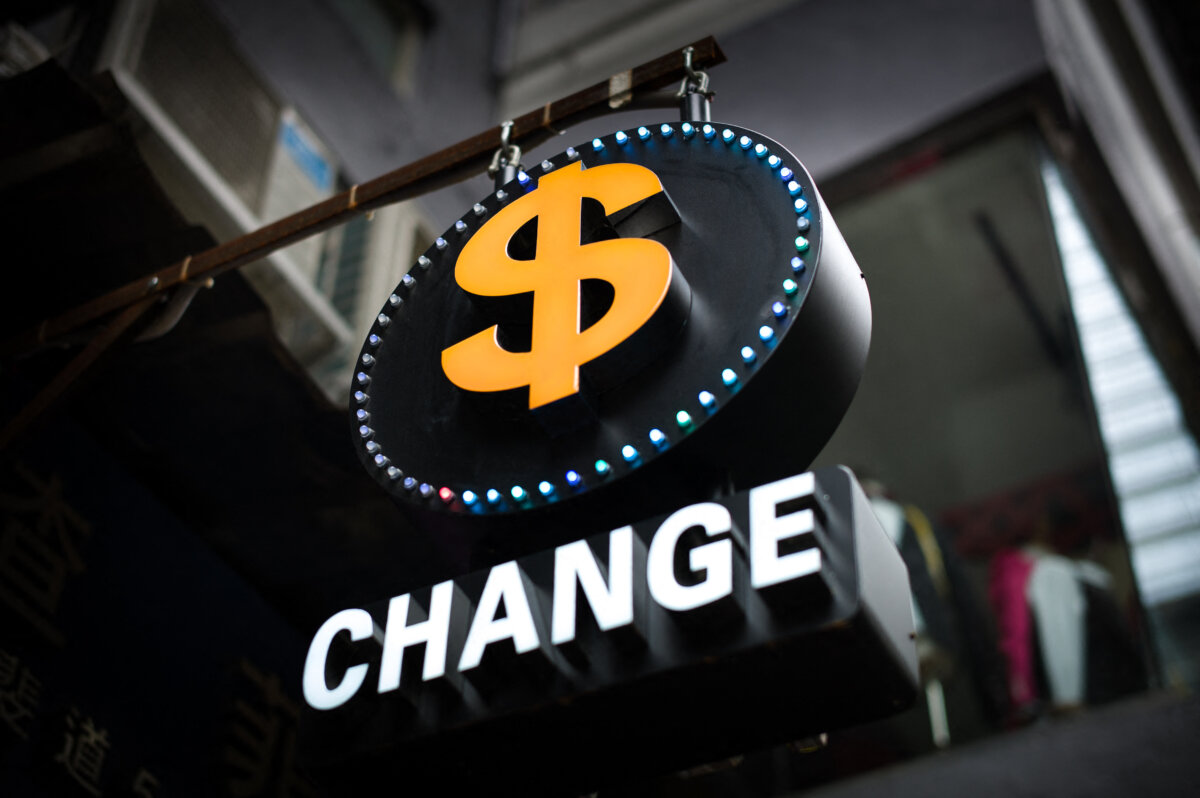 A currency sign is seen in Hong Kong on Aug. 11, 2015. (Philippe Lopez/AFP via Getty Images)