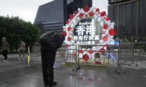 Hong Kong Locals Bow to Commemorative Plaque to Mourn 28-Year Anniversary of Transfer of Sovereignty