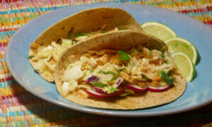 Salmon Tacos Topped With Coleslaw