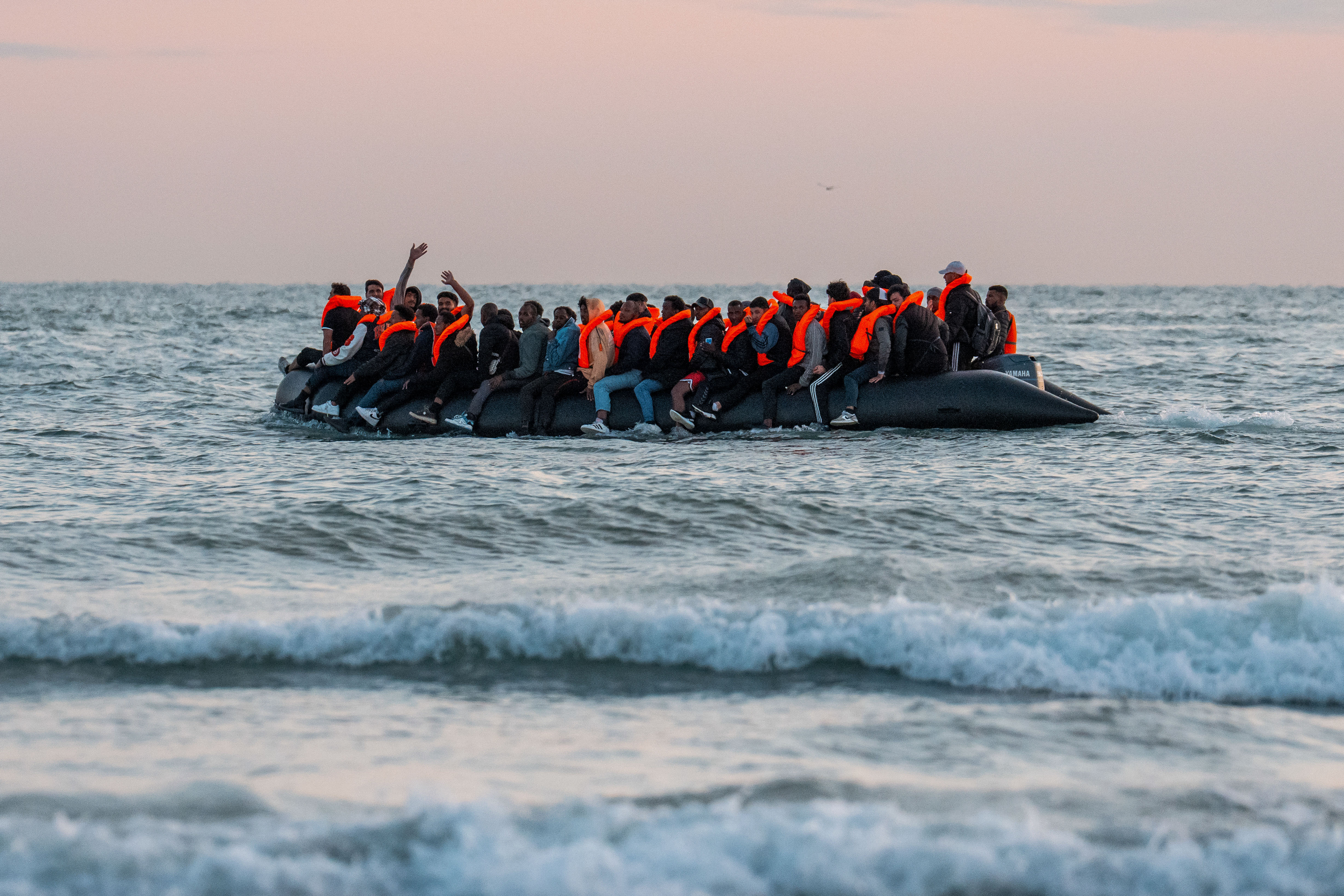 Day in Photos: Migrants in the English Channel, Beautiful Sailboats, and a Baby Pygmy Hippo