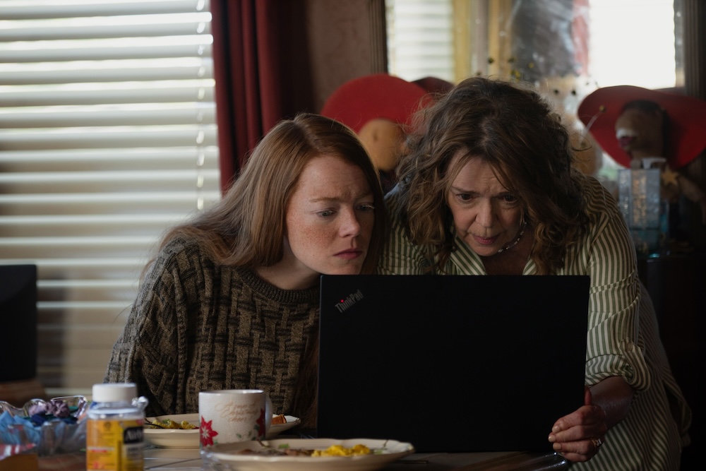 two women look at computer in Eddington