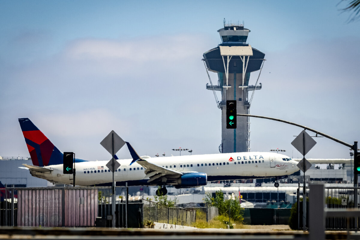 An air traffic control tower at the Los Angeles International Airport in Los Angeles on July 1, 2025. (John Fredricks/The Epoch Times)