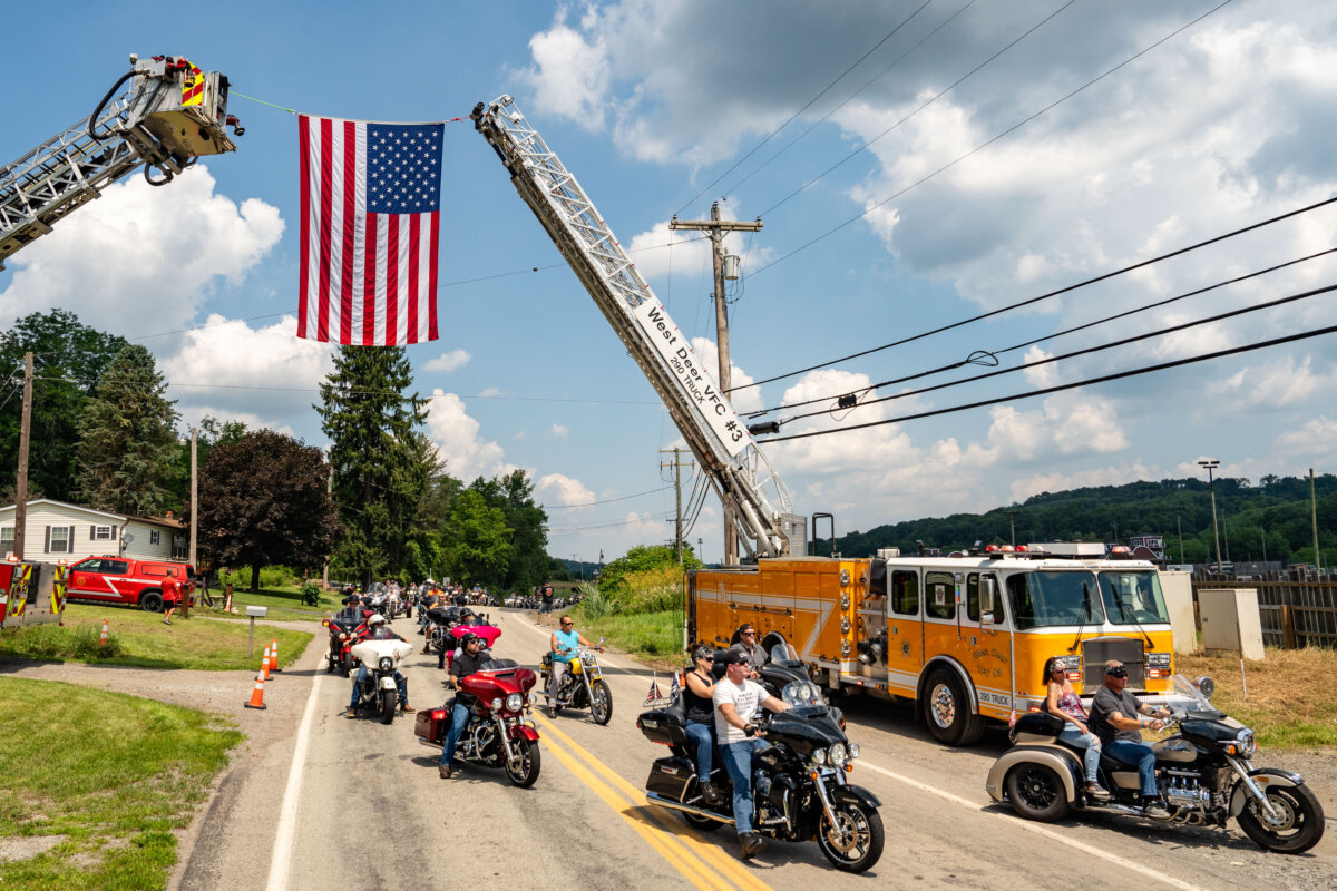 Bikers participate in a charity motorcycle run in memory of Corey Comperatore, called Corey’s Cruise, near Butler, Pa., on July 12, 2025. (Samira Bouaou/The Epoch Times)