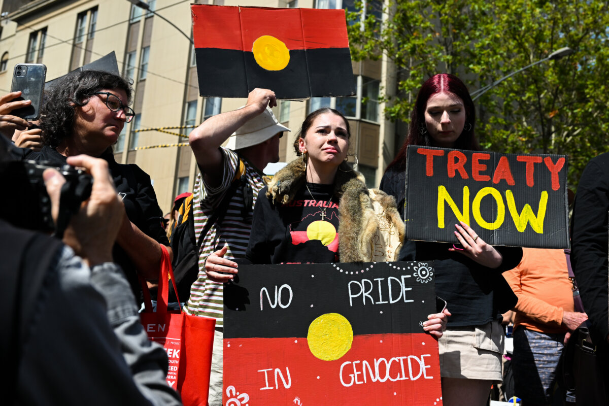 Protesters participate in the Treaty Before Voice Invasion Day Protest outside Parliament House in Melbourne, Australia on Jan. 26, 2023. (Alexi J. Rosenfeld/Getty Images)