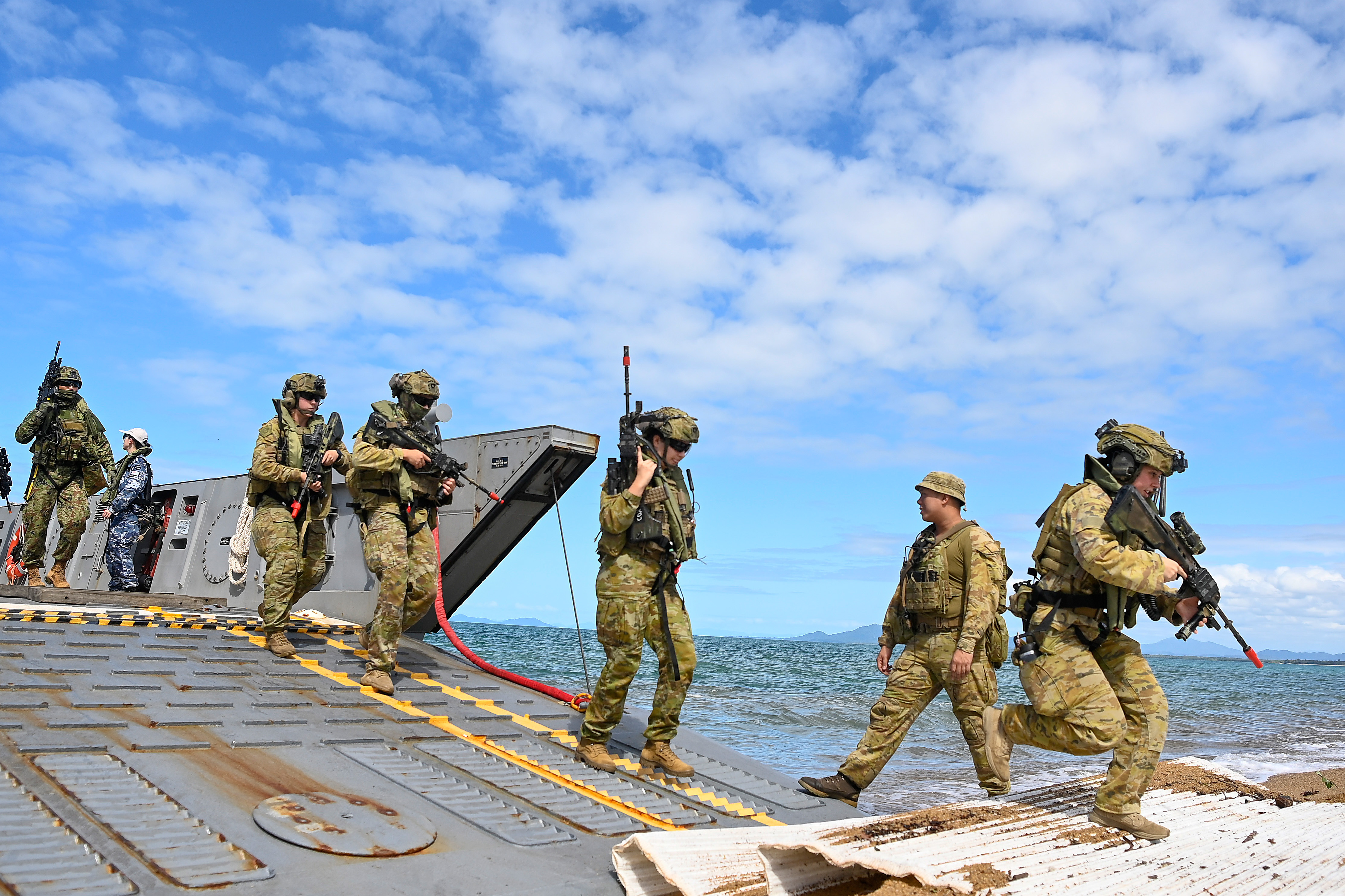 Day in Photos: Amphibious Landing Rehearsal, Grand Canyon Fire, End of San Fermin