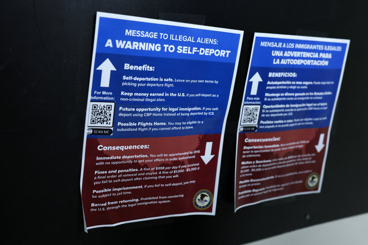 A poster with a self-deport warning message is seen on a wall outside of a courtroom at New York-Federal Plaza Immigration Court inside the Jacob K. Javitz Federal Building in New York City on June 11, 2025. (Charly Triballeau/AFP via Getty Images)
