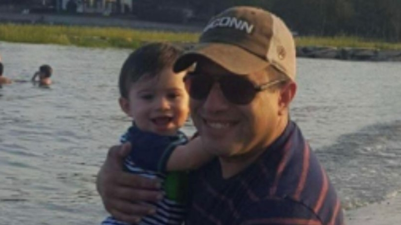 Dan Rivera (R) with his son in a file photo. (Credit: GoFundMe)