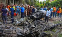 Day in Photos: Bangladesh Air Crash, Belgian National Day, and Releasing Turtles Into the Sea