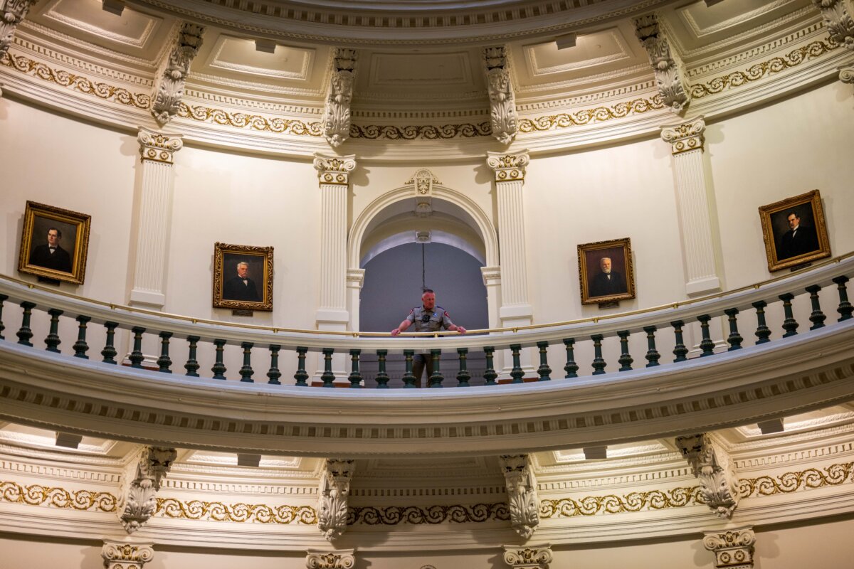 A law enforcement officer stands near the entrance to the House of Representatives in the State Capitol in Austin, Texas, on July 21, 2025. (Brandon Bell/Getty Images)