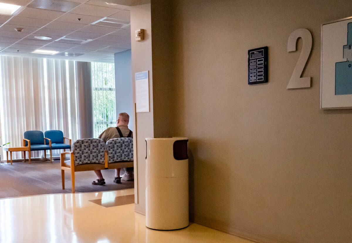 A man waits in a hospital in Irvine, Calif., on July 8, 2025. (John Fredricks/The Epoch Times)