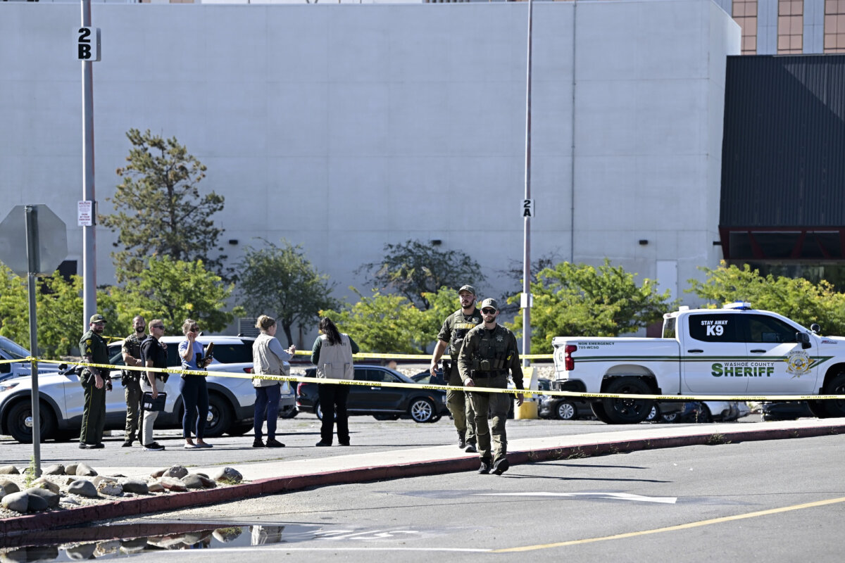 Police respond to a shooting outside the Grand Sierra Resort in Reno, Nev., on July 28, 2025. (AP Photo/Andy Barron)