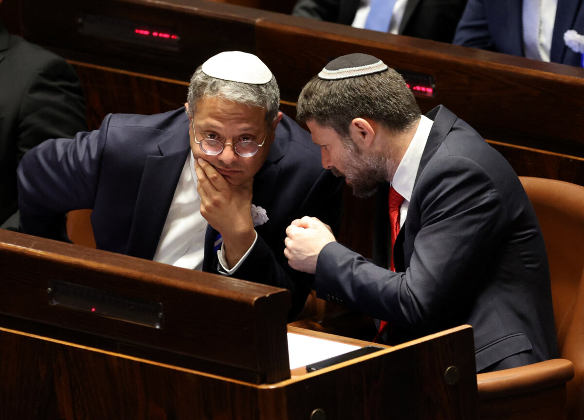Israeli right wing Knesset member Itamar ben Gvir (L) and Bezalel Smotrich (R) chat at the Knesset (Israeli parliament) in Jerusalem, on Nov. 15, 2022.(Abir Sultan/Pool/AFP via Getty Images)