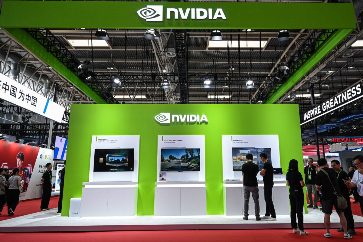 People view the Nvidia booth during the China International Supply Chain Expo in Beijing on July 16, 2025. (Jade Gao/AFP via Getty Images)
