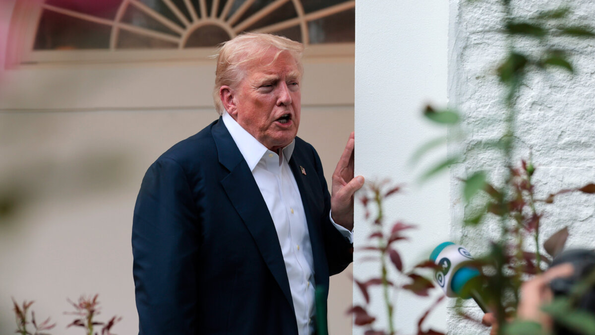 President Donald Trump speaks to reporters near the Rose Garden after returning to the White House on Marine One, in Washington on July 29, 2025. (Photo by Anna Moneymaker/Getty Images)