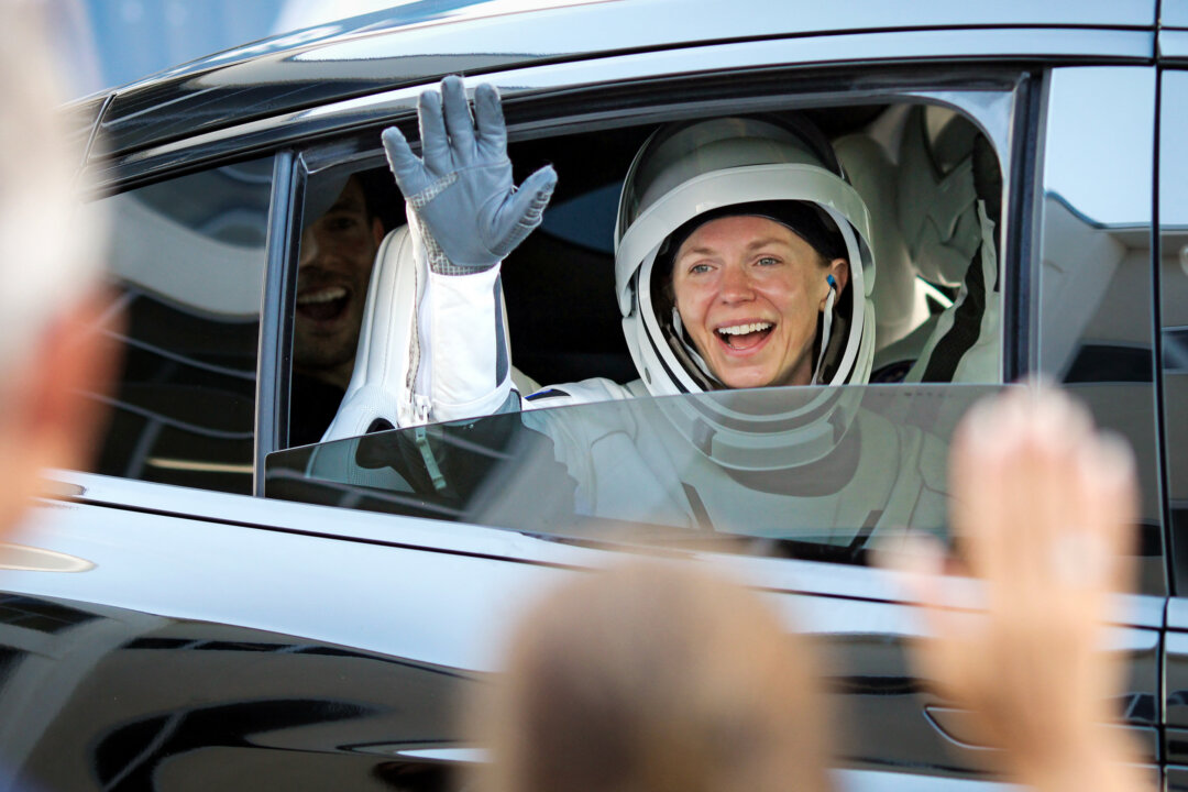 NextImg:Day in Photos: NASA Crew Flies to ISS, Funeral of Slain NYPD Officer, and Blue-Green Algae Blooms