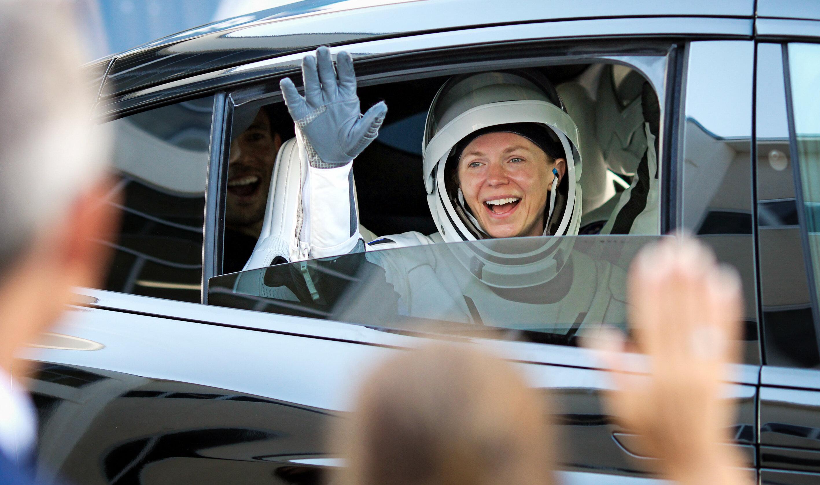 Day in Photos: NASA Crew Flies to ISS, Funeral of Slain NYPD Officer, and Blue-Green Algae Blooms