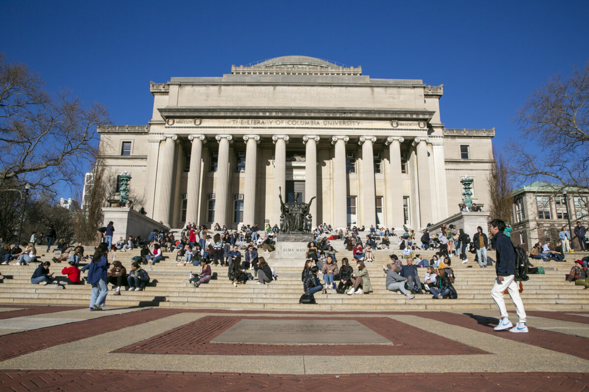 Students sit on the front steps of Low Memorial Library on the Columbia University campus in New York City, on Feb. 10, 2023. (Ted Shaffrey, File /AP Photo)
