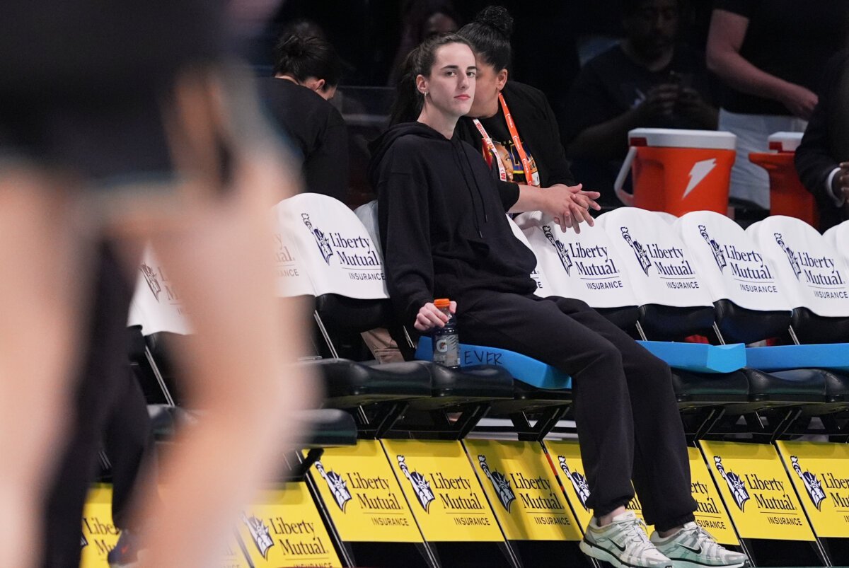 Indiana Fever's Caitlin Clark watches as players warm up before a WNBA basketball game between the New York Liberty and the Fever in New York on July 16, 2025. (Frank Franklin II/AP Photo)