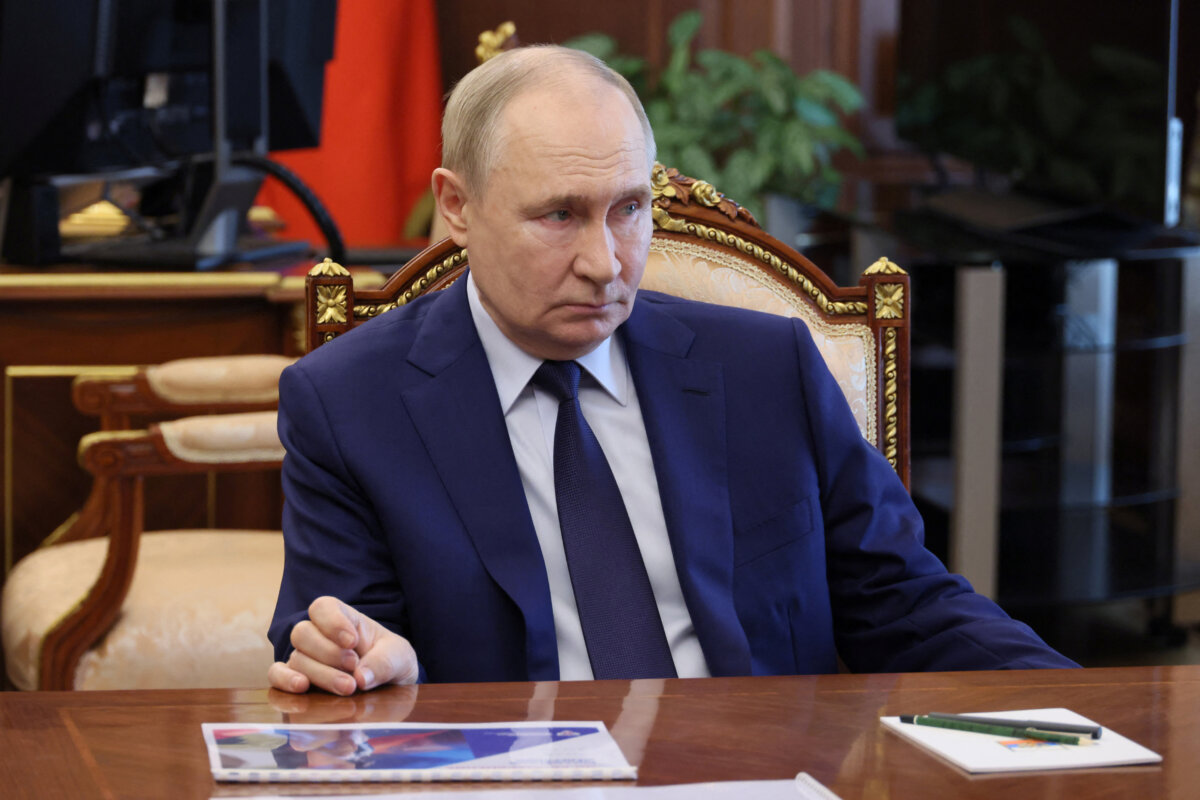 Russian President Vladimir Putin chairs a meeting on social issues, in Moscow, Russia, on July 14, 2025. (Sputnik/Mikhail Metzel/Reuters)