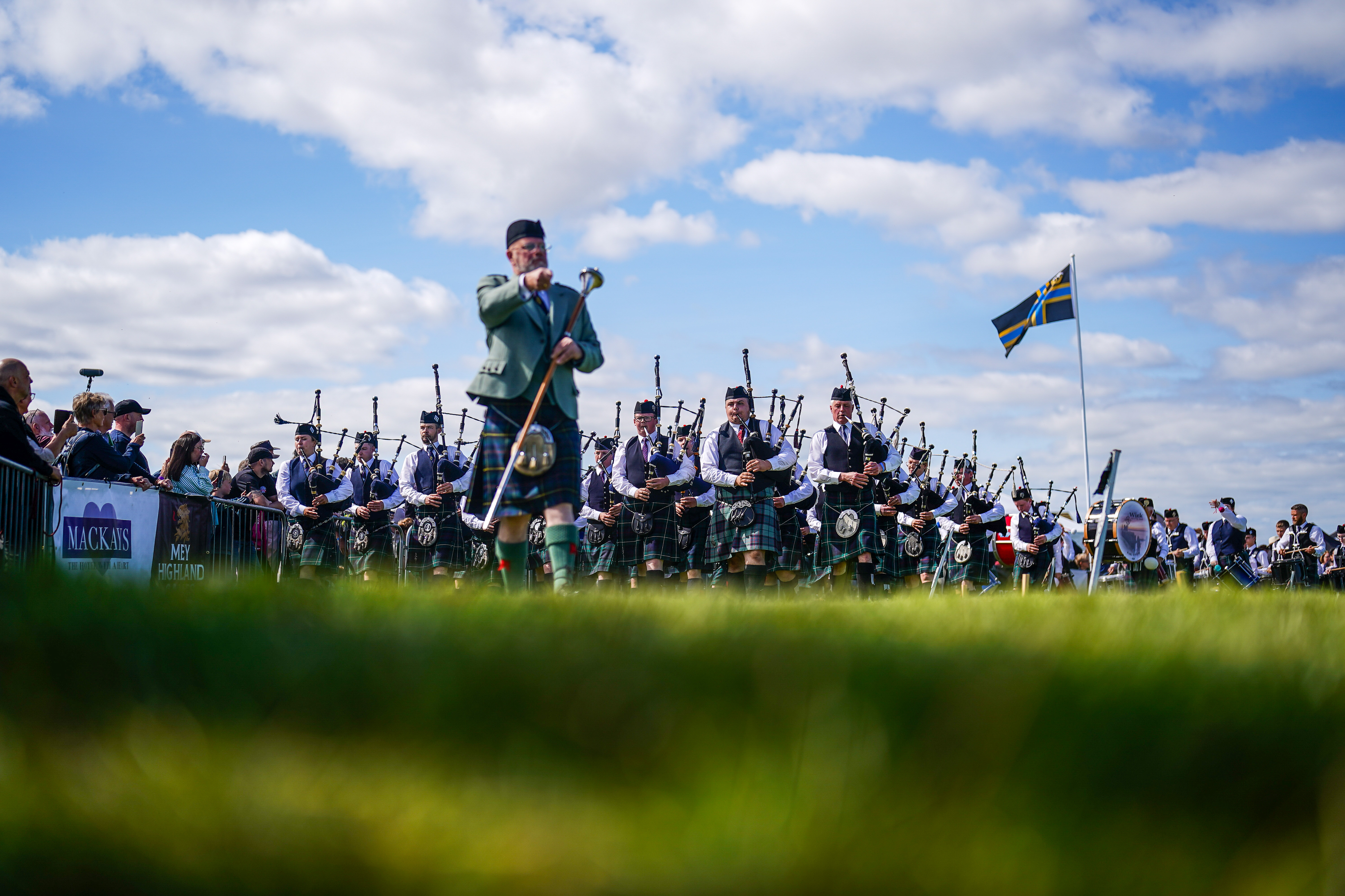 Day in Photos: Mey Highland Games, Protests in Thailand, and Mass Taekwondo Lesson