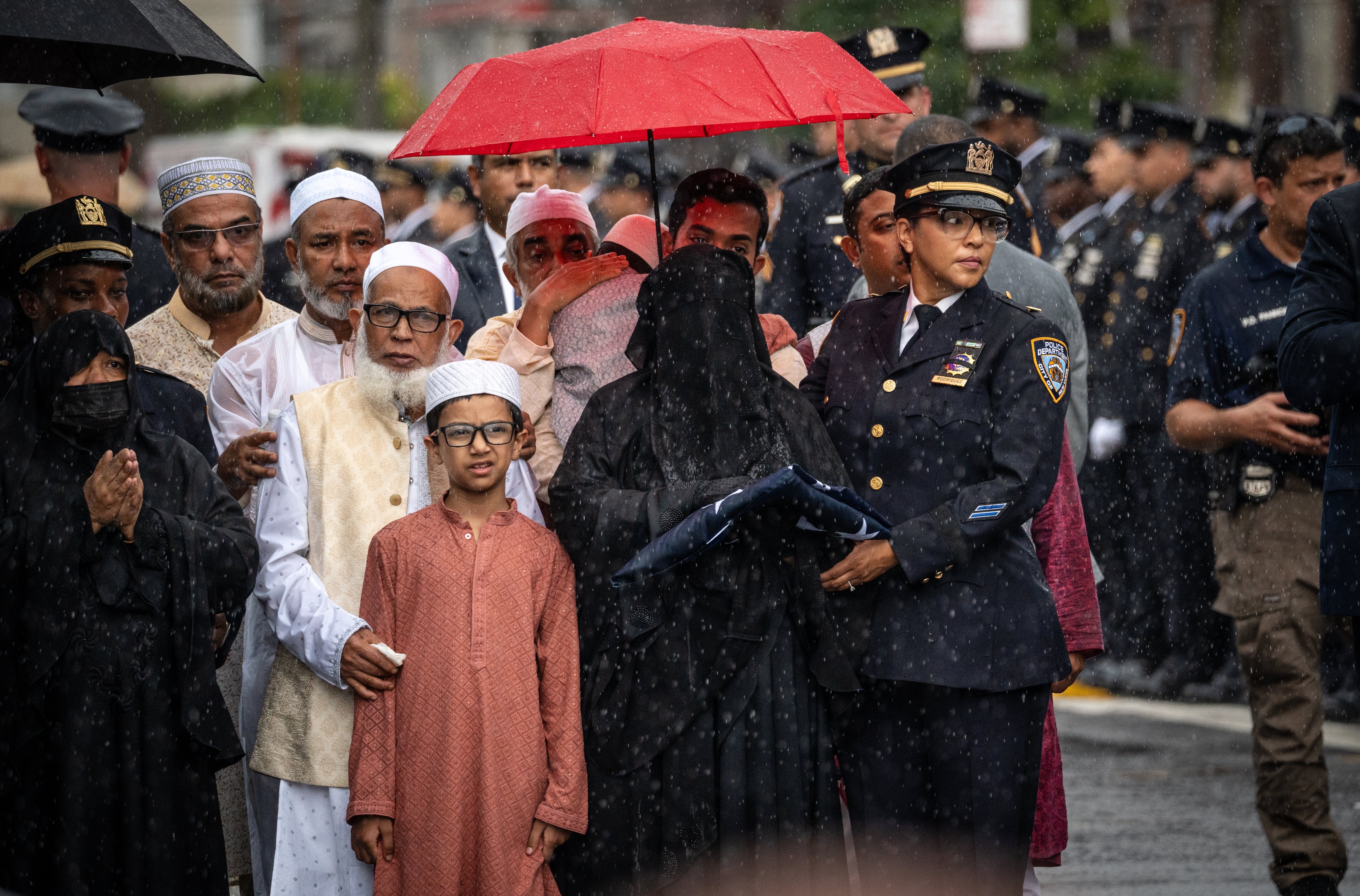 America in Photos: The Funeral of Didarul Islam, Tesla Diner Opening, and Indiana State Fair
