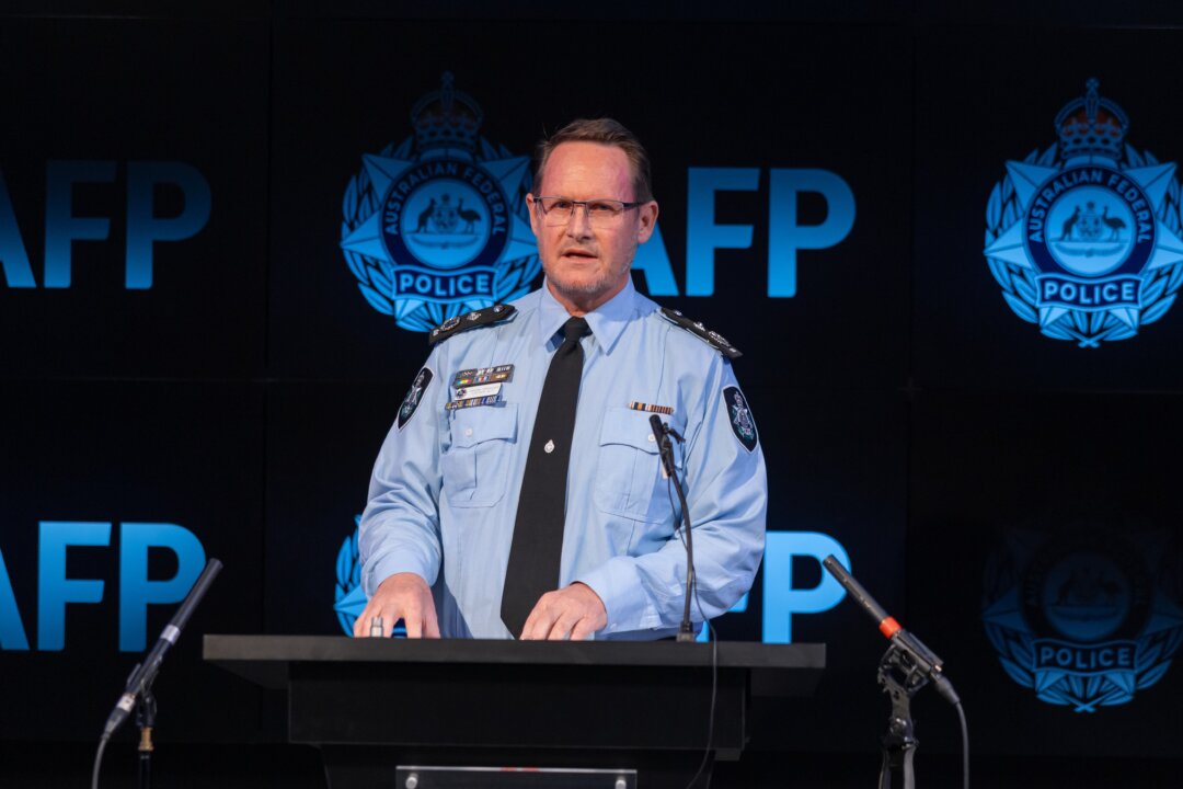 Chinese Woman Charged in Canberra Interference Case