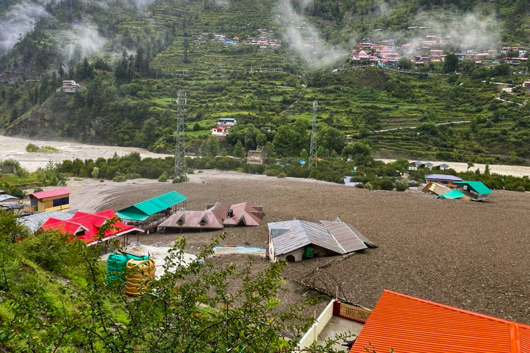 NextImg:Day in Photos: Landslide in India, Hiroshima Bombing Anniversary, Overturned Boat in Bali
