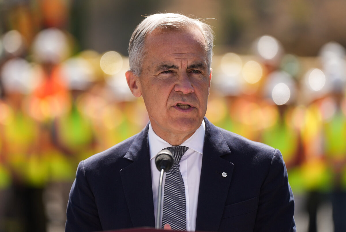 Prime Minister Mark Carney speaks at the Gorman Brothers Lumber sawmill in West Kelowna, B.C., on Aug. 5, 2025. (The Canadian Press/Darryl Dyck)