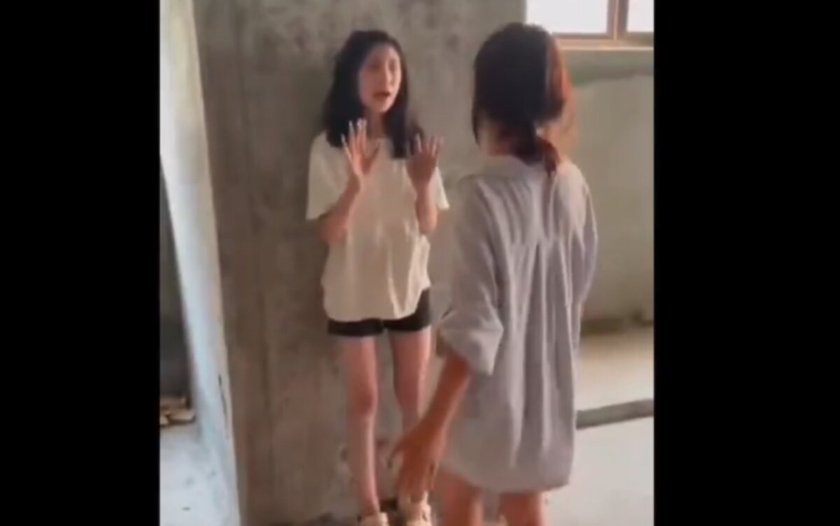 Video footage, taken and shared online by associates of the assailants, shows the assault of a 14-year-old student in Sichuan, China, on July 22, 2025. (Screenshot via The Epoch Times)