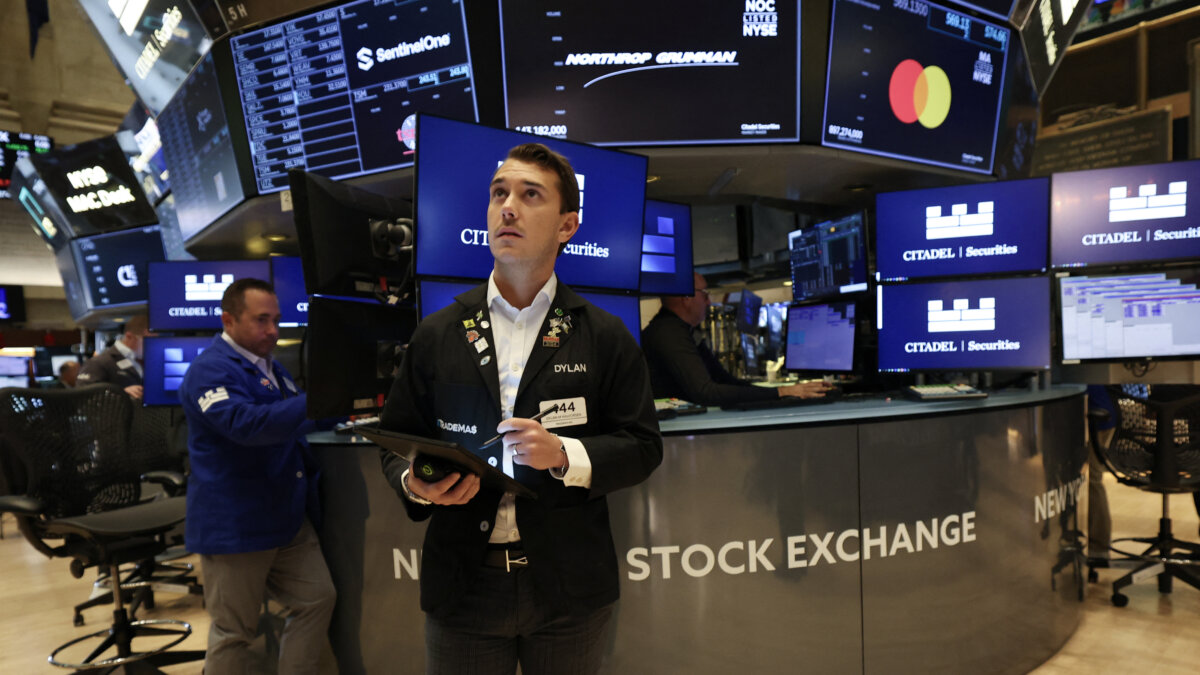 Traders work on the floor of the New York Stock Exchange in New York City on Aug. 7, 2025. (Timothy A Clary/AFP via Getty Images)