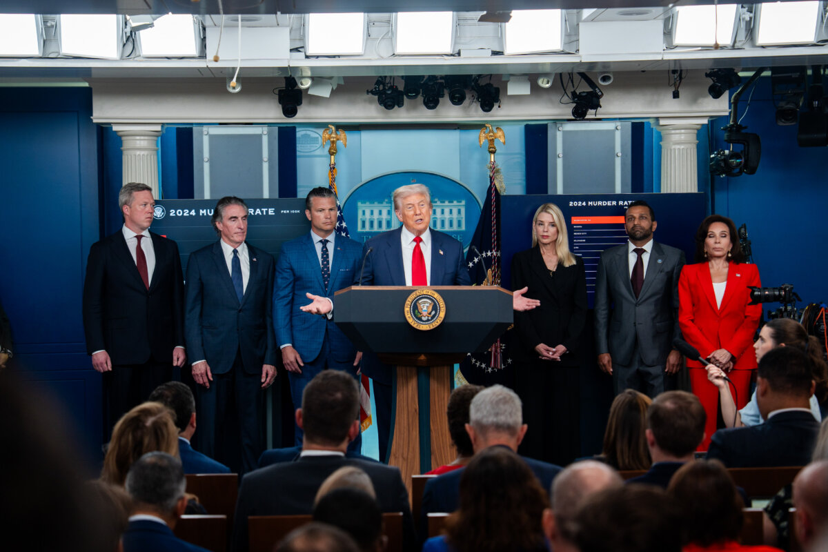President Donald Trump (C) and (L-R) Army Secretary Dan Driscoll, Secretary of the Interior Doug Burgum, Defense Secretary Pete Hegseth, Attorney General Pam Bondi, FBI director Kash Patel, and District of Columbia Attorney Jeanine Pirro during a press briefing at the White House in Washington on Aug. 11, 2025.(Madalina Kilroy/The Epoch Times)